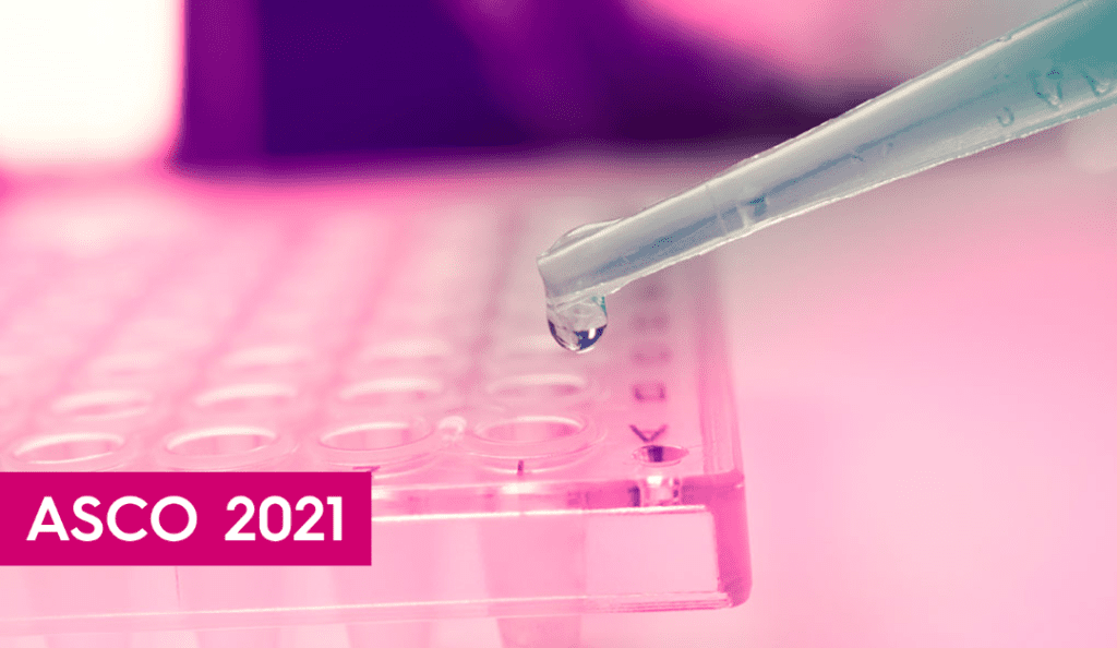 a closeup of a pipette in a lab with a pink tone to the image