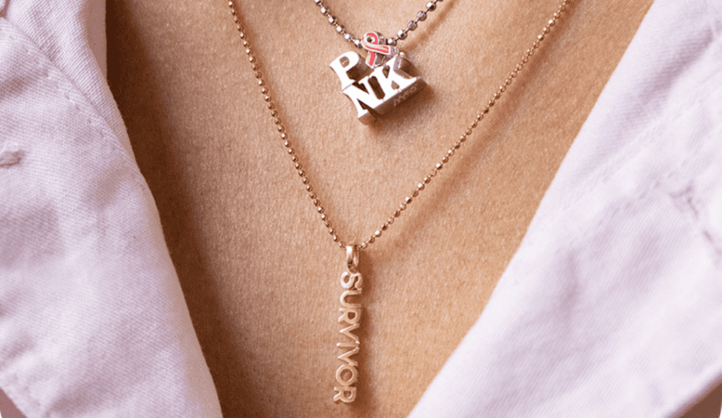 bcrf-alex-woo-tribute-2021|The late Alex Woo stands with BCRF CEO and President Myra Biblowit and Ann Caruso