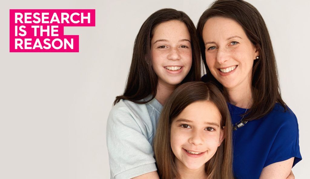 a portrait of jennifer with her two daughters