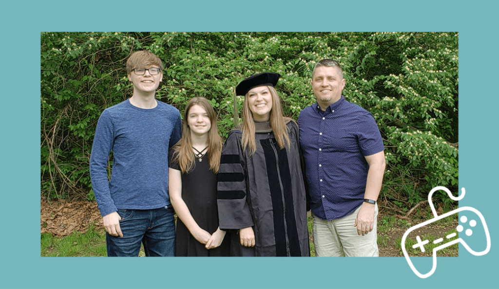 portrait of the bytnar family outside at misty's graduation from pharmacy school