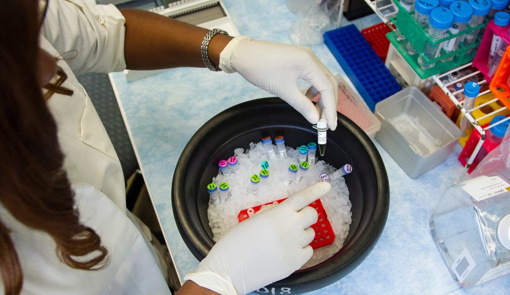 Lab worker with samples