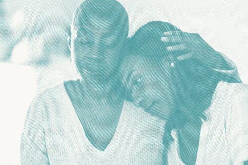 a woman and her daughter embrace