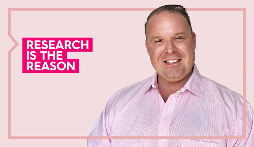 a portrait of barner wearing a pink shirt against a pink background