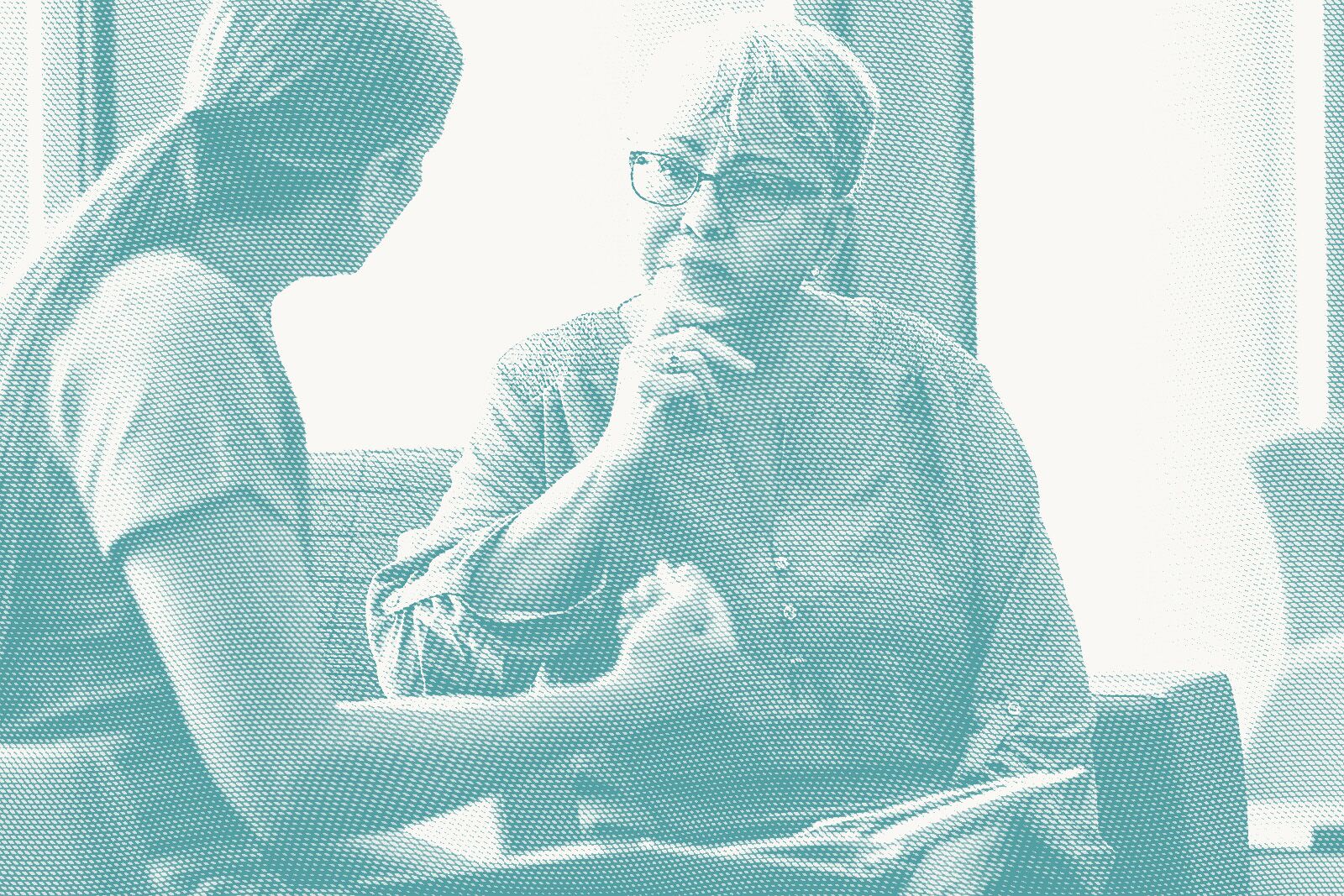 an older woman speaks with her doctor