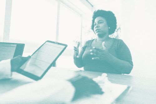 a woman speaks to her doctor