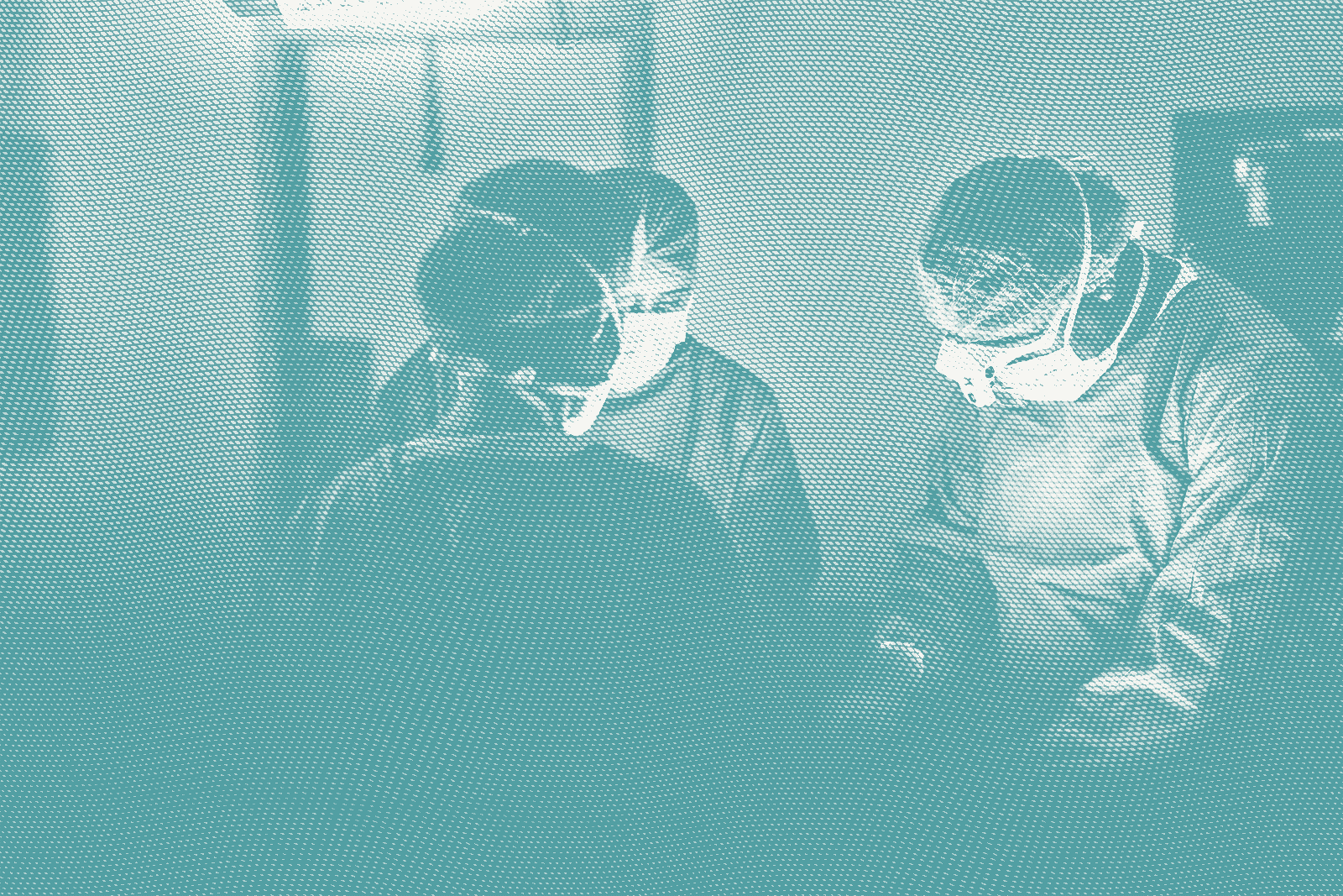 Several surgeons around a patient; illustrative of breast cancer surgery