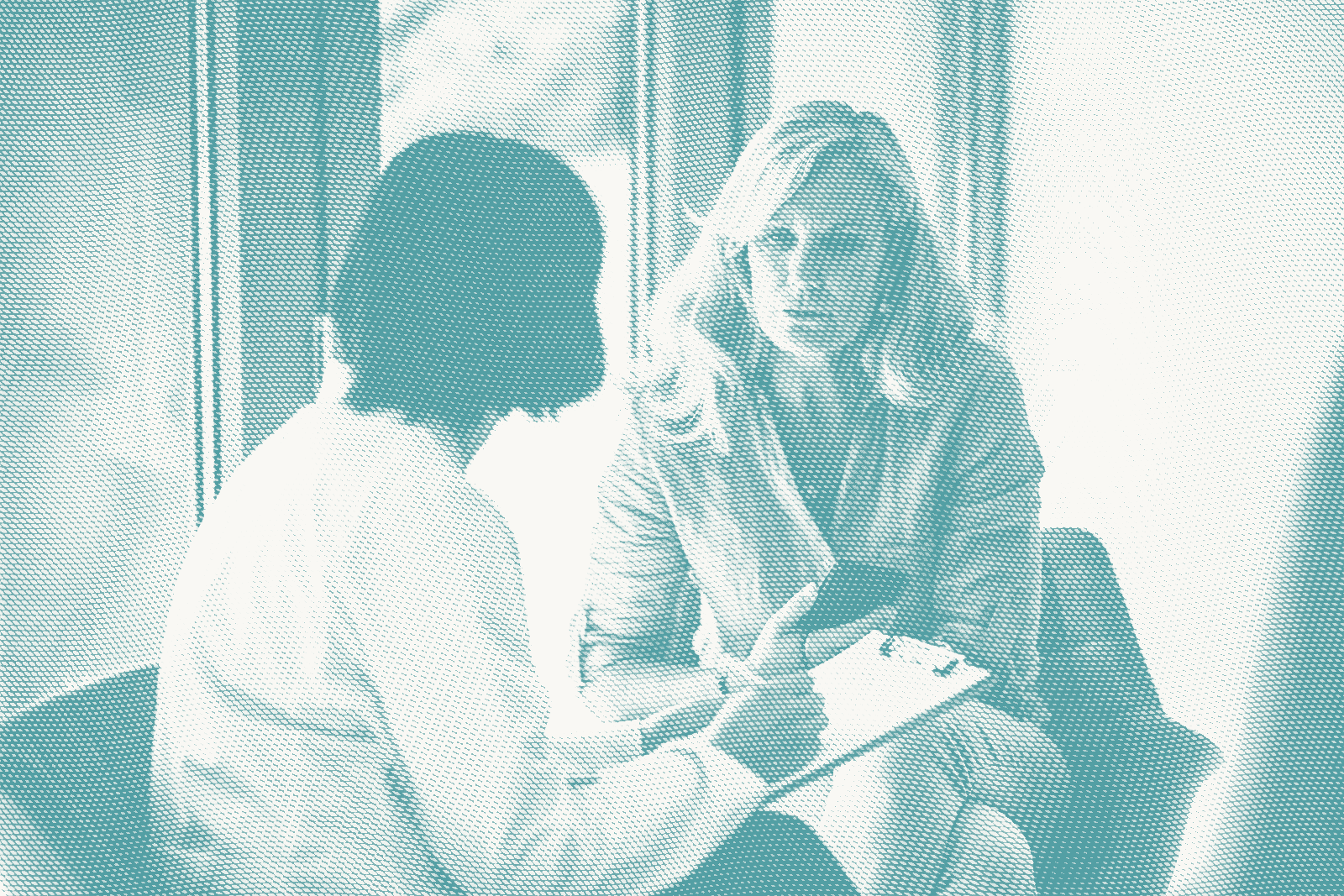 a woman consults with a doctor about targeted therapy for breast cancer