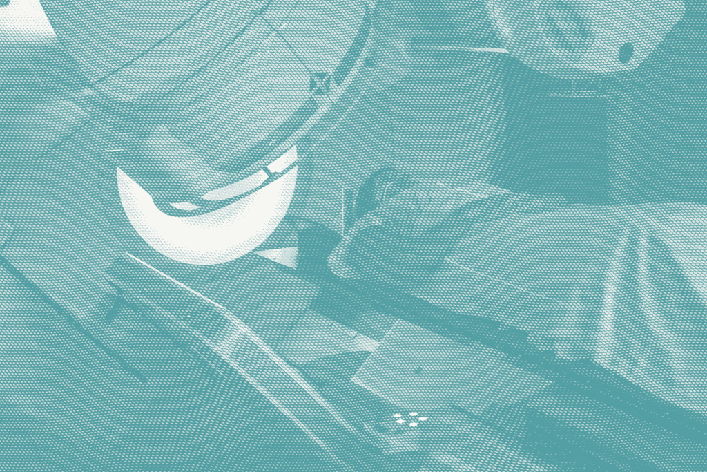 a woman gets radiation for breast cancer; she lies down with the machine overhead