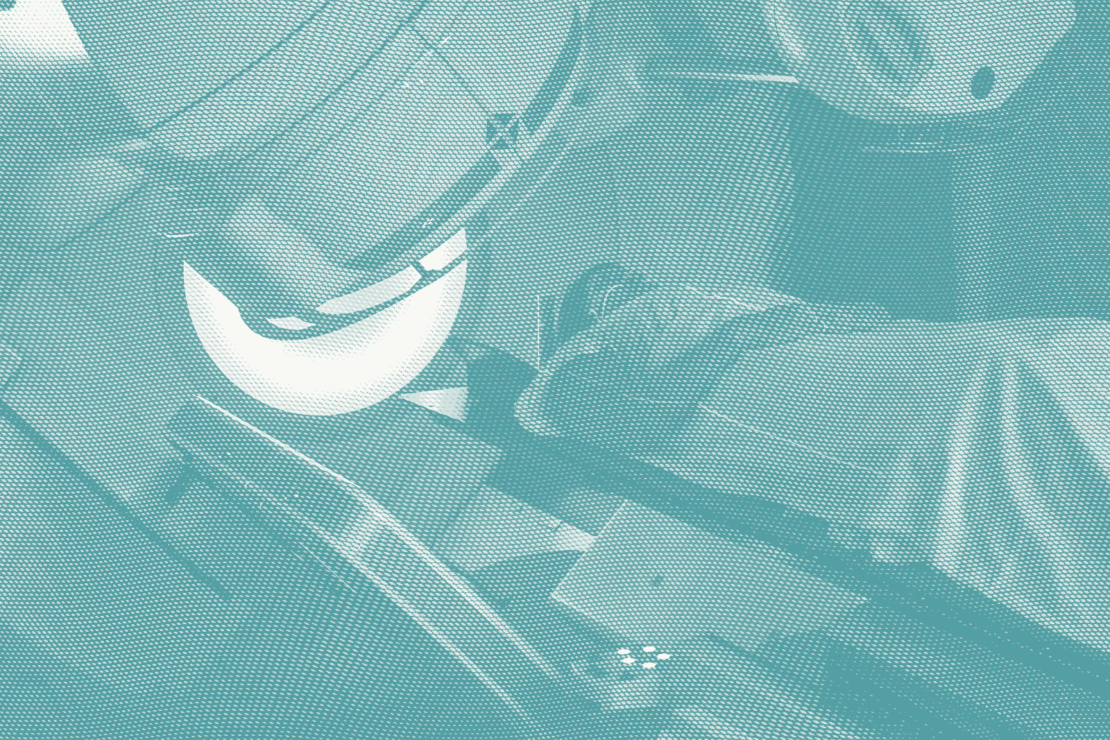 a woman gets radiation for breast cancer; she lies down with the machine overhead