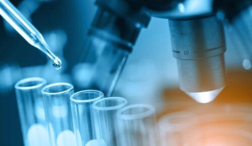 a microscope and vials